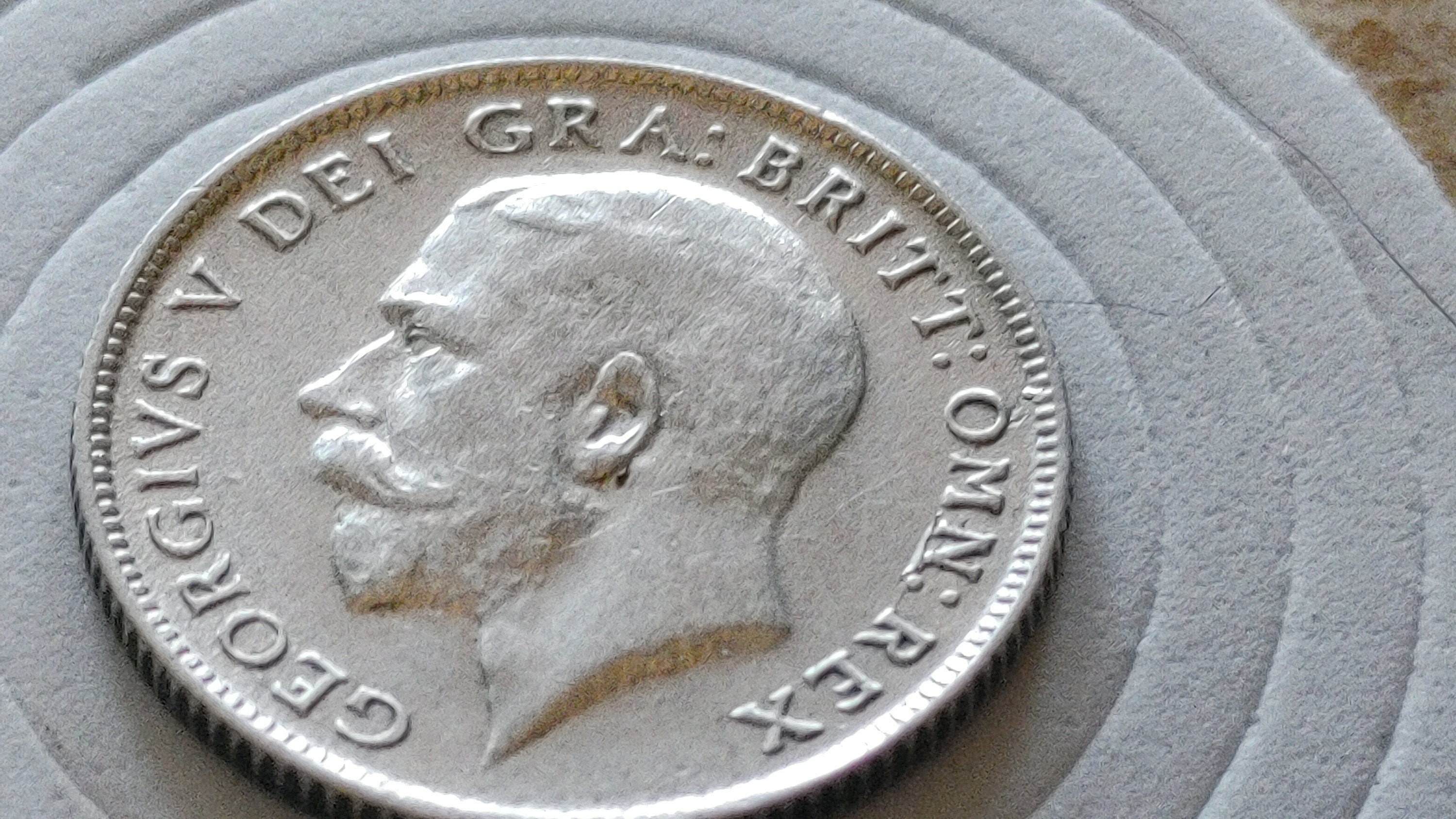 1921 United Kingdom silver sixpence about uncirculated superb details with new holder included.
