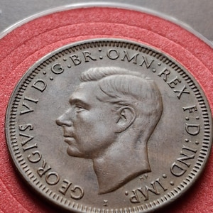 About uncirculated nicely toned 1943 I bombay minted Australia Penny With Holder and gift box