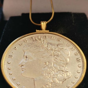 True Americana 1891 O New Orleans Minted Morgan American Silver Dollar Pendant and 18kgf Gold Filled snake chain. 38mm w COA & Box