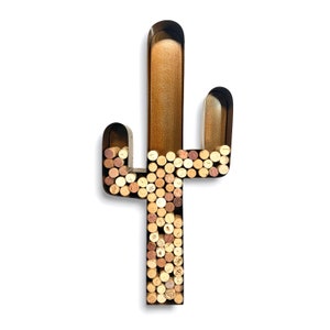 May include: A metal cactus-shaped wine cork holder with a rustic brown finish. The holder is filled with wine corks, creating a decorative and functional piece for any home.