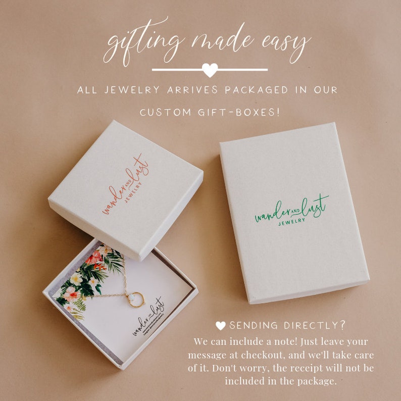 May include: Two white gift boxes with the logo "wanderlust jewelry" printed on them. The boxes are open and show a necklace with a circle pendant inside one of the boxes. The text "SENDING DIRECTLY? We can include a note! Just leave your message at checkout, and we'll take care of it. Don't worry, the receipt will not be included in the package." is printed below the boxes.