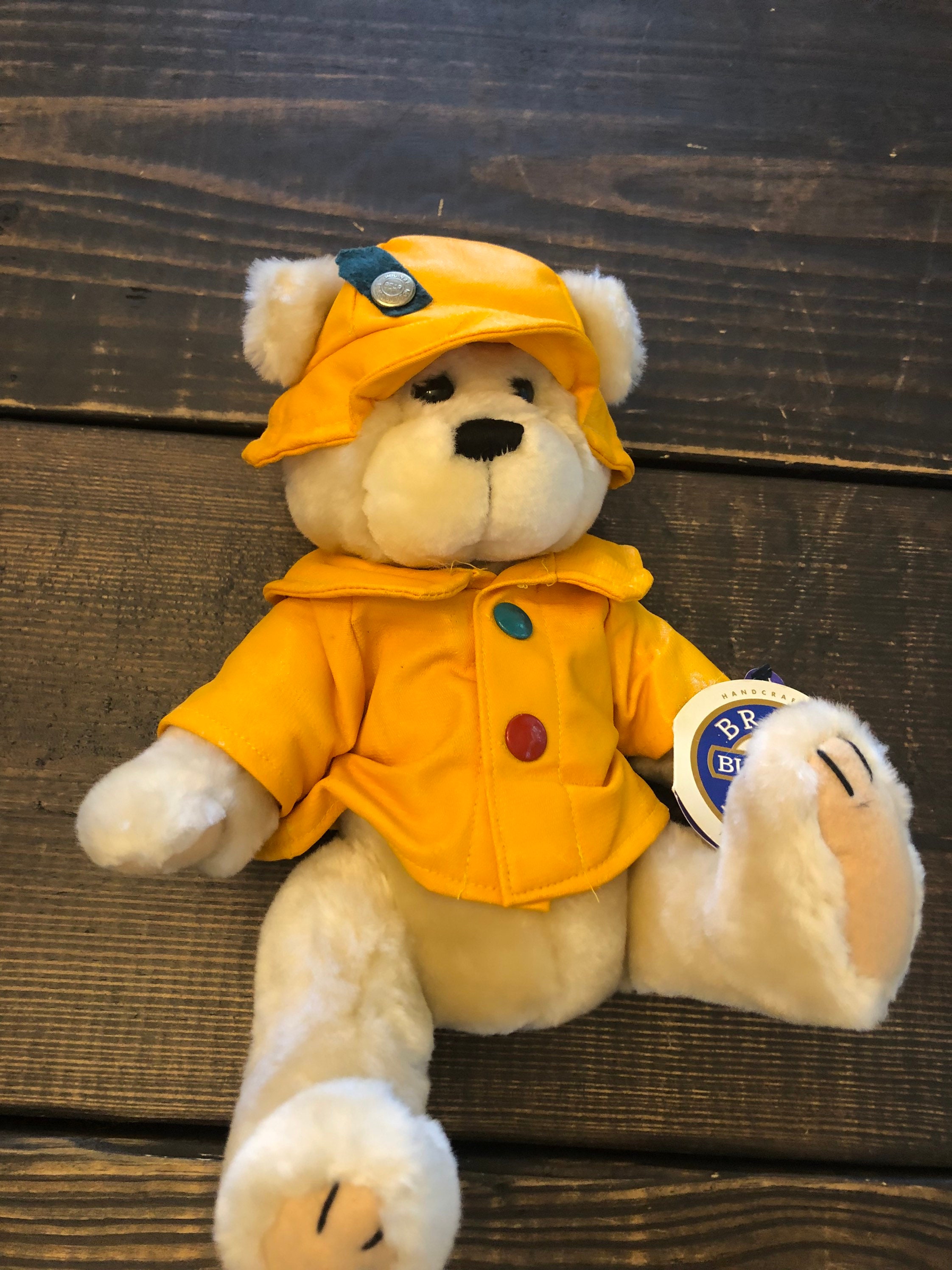 yellow raincoat teddy bear