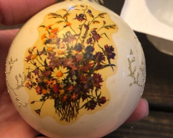 Vintage set of 4 glass ornaments. Floral designs on 2 in original box.