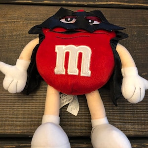 M&M red plush stuffed toy with Mask and Cape