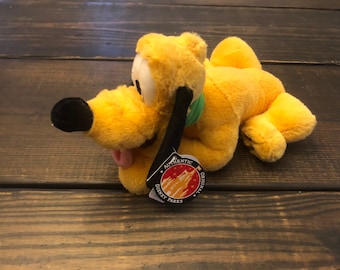 Disney Parks Pluto plush stuffed animal with tags