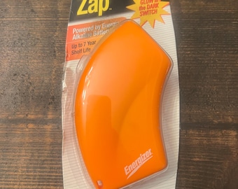Vintage 1999 2000 Orange Energizer Zap Flashlight still In packaging Nip