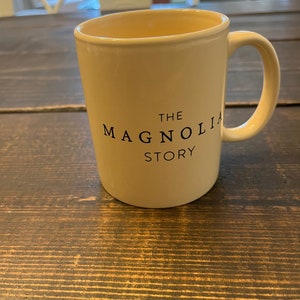 The Magnolia Story Coffee Mug Light Yellow Black Letters Chip Joanna Gaines Waco