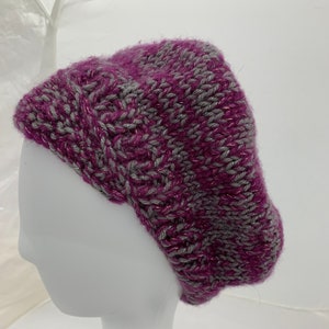 Hand knit cap with brim