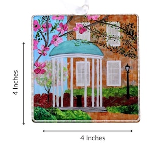 UNC Old Well acrylic ornament featuring original artwork of the iconic University of North Carolina Chapel Hill landmark in Carolina blue.