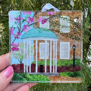 Tar Heels holiday ornament featuring Jeanne Player Fine Art artwork of the historic Old Well at UNC Chapel Hill.