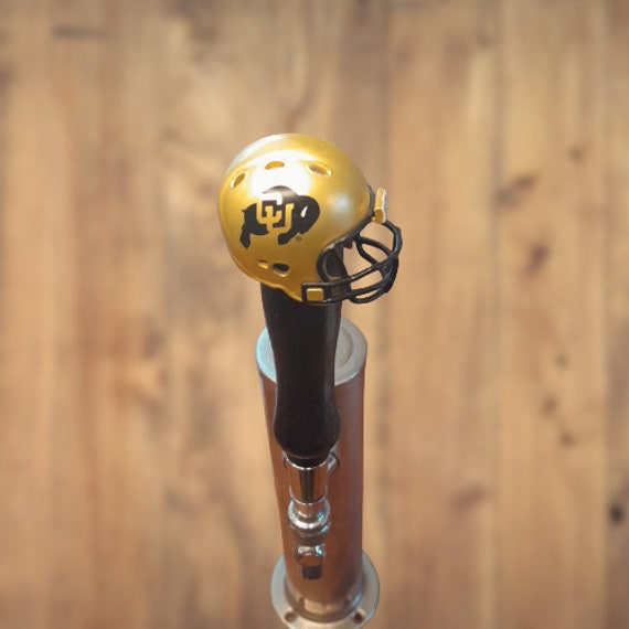 beer dispensing football helmet Drinking  Boulevard Brewing Co The beer tower features a black football helmet base design Houston Texans Pub Style Helmet