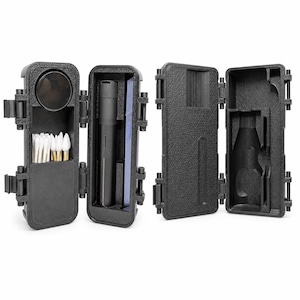 May include: A black, rectangular, hinged carrying case with a textured exterior. The open case reveals custom-molded compartments containing a black cylindrical tool, a circular black component, and a row of white cotton swabs with wooden sticks.