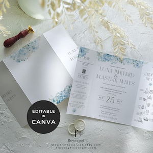 May include: A tri-fold wedding invitation with blue floral accents and the names Luna Harvard & Alastair James. The invitation includes details, RSVP information, and a wedding date of October 25th. The text "Editable in Canva" is also visible.