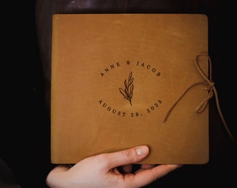 Customized guest book in rustic leather covers with laser engravement // personalized wedding guest book