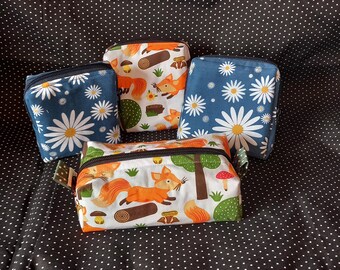 Coin purse, modesty pouch, loose change? Sanitary products? Stuff floating about in the bottom of your bag? Perfect little pouches!