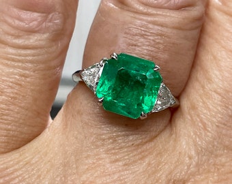 Reserved Estate Vintage GIA certified 5.28ct Colombian Green Emerald and Diamond Three-Stone Platinum Ring signed VCA  Van Cleef and Arpels.