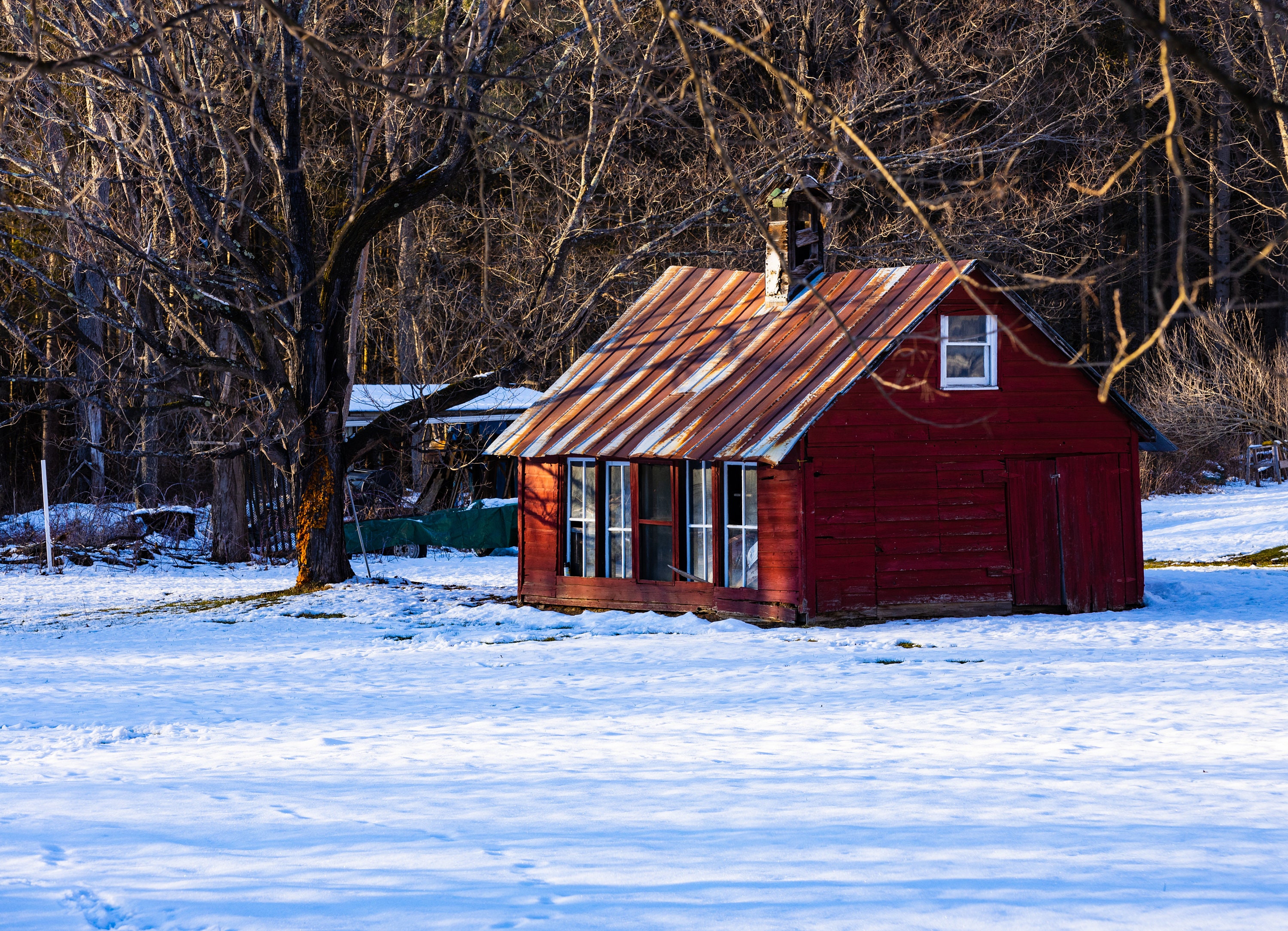 Winter farmland red barn wall art. Rural New York farm landscape snow scene.  Cabin interior design. Winter snow and ice. Digital Image