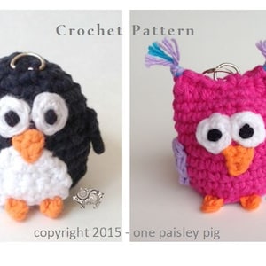 May include: Two crocheted amigurumi keychains, one a black and white penguin and the other a pink owl with purple accents. Both have black eyes and orange beaks. The text "Crochet Pattern" and "copyright 2015 - one paisley pig" is visible.