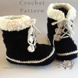 May include: A pair of black crocheted baby booties with white faux fur trim and white laces. The booties have a crocheted white border around the sole. The text "Crochet Pattern" is at the top of the image.