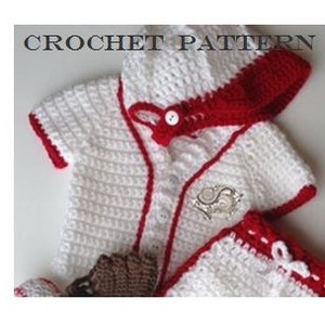 May include: White crocheted baby outfit with red trim, featuring a hooded jacket, shorts, and a button closure. The outfit has a baseball theme.
