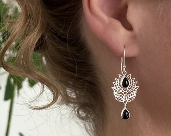 delicate earrings with flower pattern and stones silver