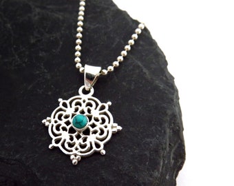 small pendant silver with a turquoise stone