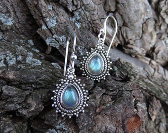 small silver earrings with drop shaped stone