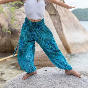 turquoise kids pants with two pockets zdjęcie 2