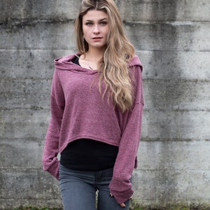 half long knit shirt with hoodie and thumbholes in red