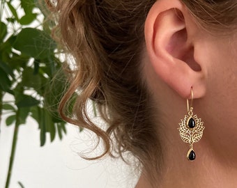 delicate earrings with flower pattern and stones brass
