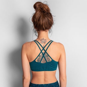 yoga top with detailed back design and flower of life print in turquoise/white image 1