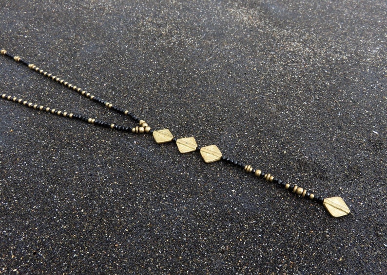 long necklace with spirals, brass and facetted glas beads schwarz