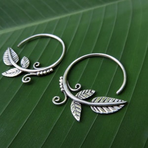 small earrings with leaves and spirals image 2