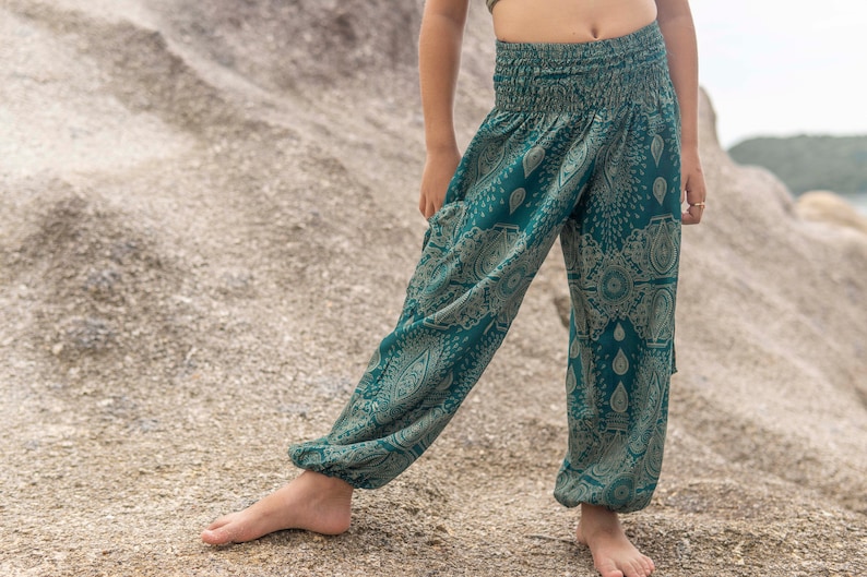 turquoise kids pants with two pockets image 4