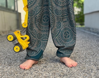 petrol blue kids pants with two pockets