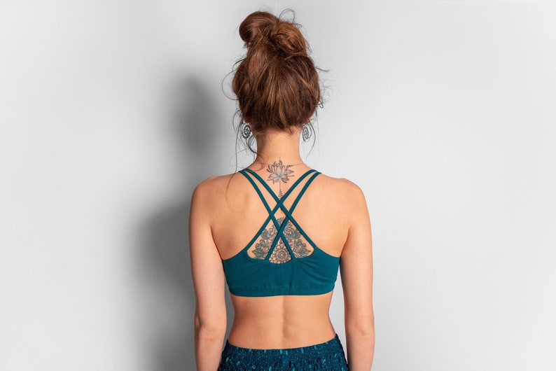 yoga top with detailed back design and flower of life print in turquoise/white image 1