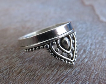 silver ring with small dots