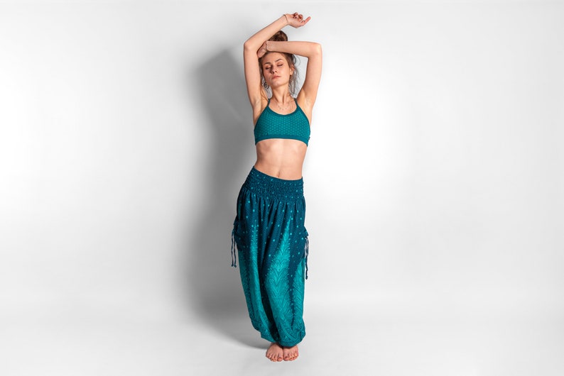 yoga top with detailed back design and flower of life print in turquoise/white image 3