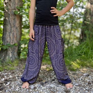 dark blue kids pants with two pockets