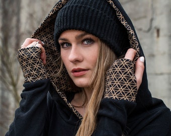 pull long en maille avec capuche à motif et trous pour les pouces en noir