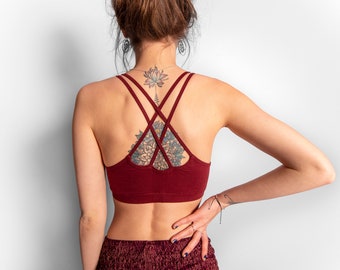 yoga top with detailed back design and flower of life print in red