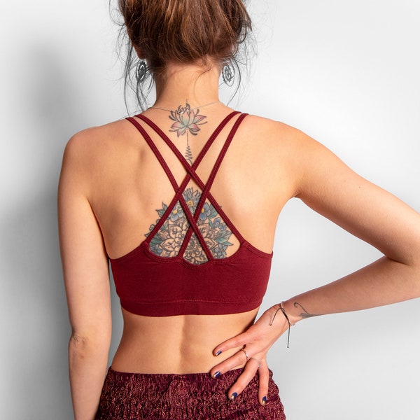 yoga top with detailed back design and flower of life print in red