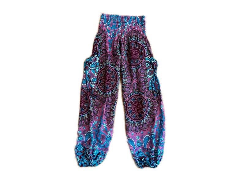 May include: Purple and blue patterned pants with an elastic waistband. The pants have a loose, flowing fit and are made of a soft, comfortable fabric.