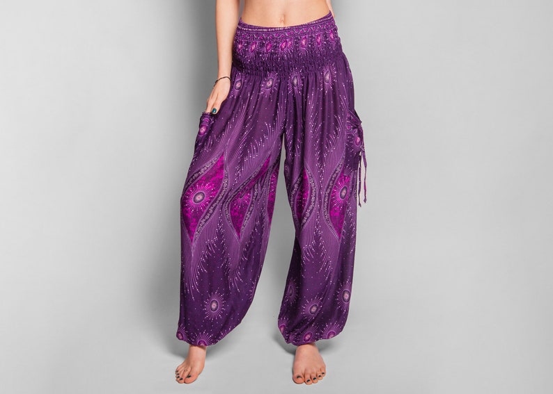 pants with peacock pattern in purple image 6