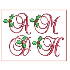 May include: Four embroidered letters: A, M, D, and H, in a decorative script font. Each letter is red and adorned with green holly leaves and red berries, suggesting a holiday theme. The letters are within a red rectangular border.