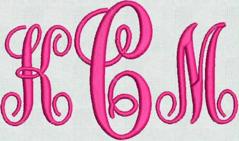 May include: Pink monogram with the letters "KCM" in a cursive script font.