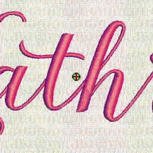 May include: Embroidered name "Kathryn" in a pink cursive font on a white fabric background.