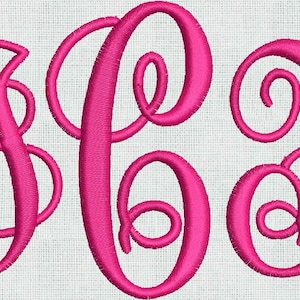 May include: Three pink embroidered letters, "S", "C", and "T", in a cursive font.
