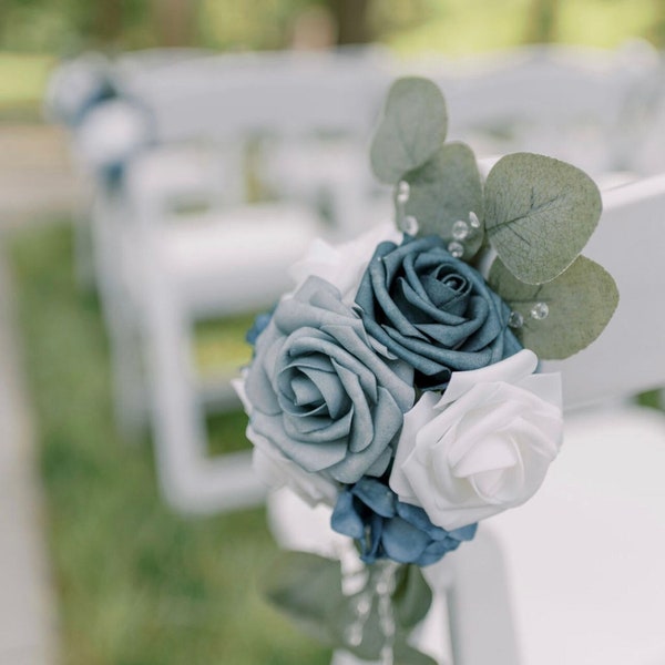 Dusty blue aisle flowers