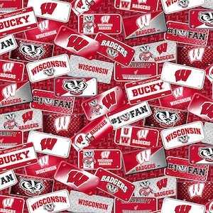 May include: A fabric print featuring a repeating pattern of red and white Wisconsin Badgers themed license plates and logos on a diamond plate metal background. The design includes text such as WISCONSIN, BUCKY, BADGERS, and #1 FAN.